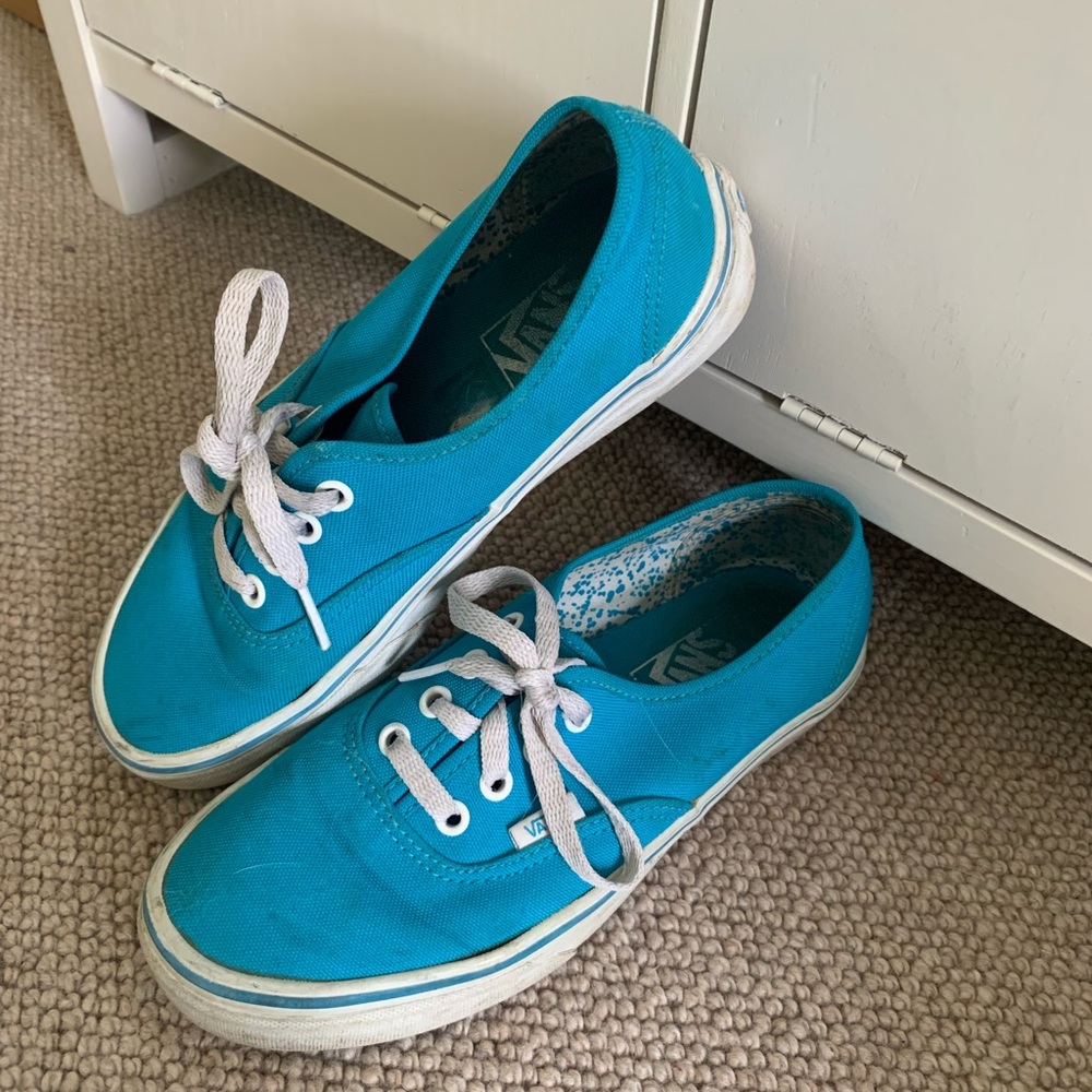 Bright blue low top vans